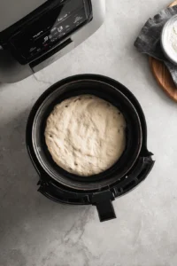 Preheat air fryer to 320 degrees Fahrenheit and cook dough wedges until golden brown