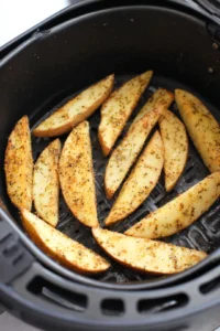 Preheat air fryer to 400 degrees Fahrenheit and arrange wedges in a single layer