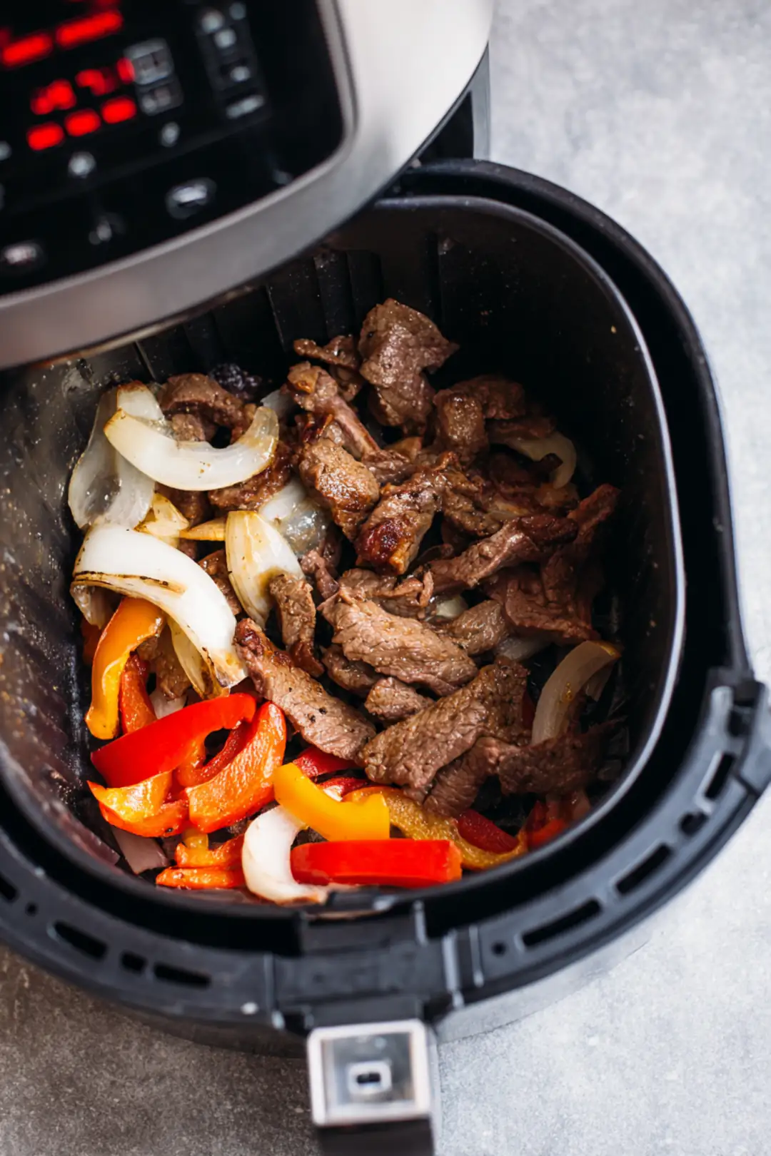 Preheat the air fryer to 350 degrees Fahrenheit and prepare your ingredients