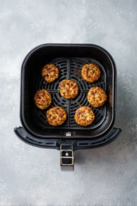 Preheat the air fryer to 375 degrees Fahrenheit and form the mixture into small patties