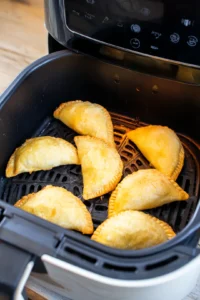 Preheat your air fryer to 350°F (175°C) and cook the chimichangas