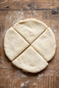 Roll dough into flat circles and preheat air fryer