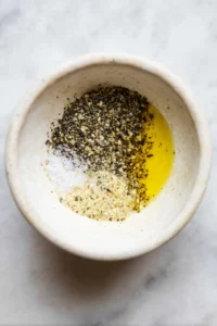 Rub seasoning blend over trout fillets