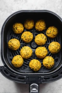 Shape the mixture into small balls or patties and place them in the air fryer basket