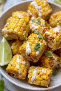 Shape the mixture into small bite-sized portions and spoon them into the greased air fryer basket. Cook at 400°F for 12-15 minutes until crispy and golden brown, flipping halfway through.