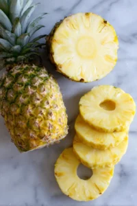 Slice pineapple into rings and remove the core