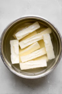 Soak halloumi fries in water for 10 minutes