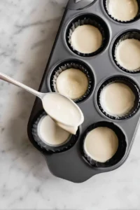 Spoon pancake batter into molds and place in air fryer
