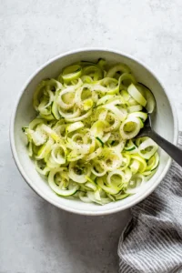Toss sliced leeks with olive oil, salt, pepper, and garlic powder