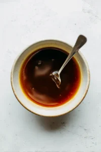 Add maple syrup and vanilla extract to the mixture, stirring to combine evenly.