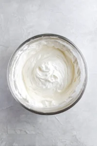 Beat the softened cream cheese and mix with powdered sugar