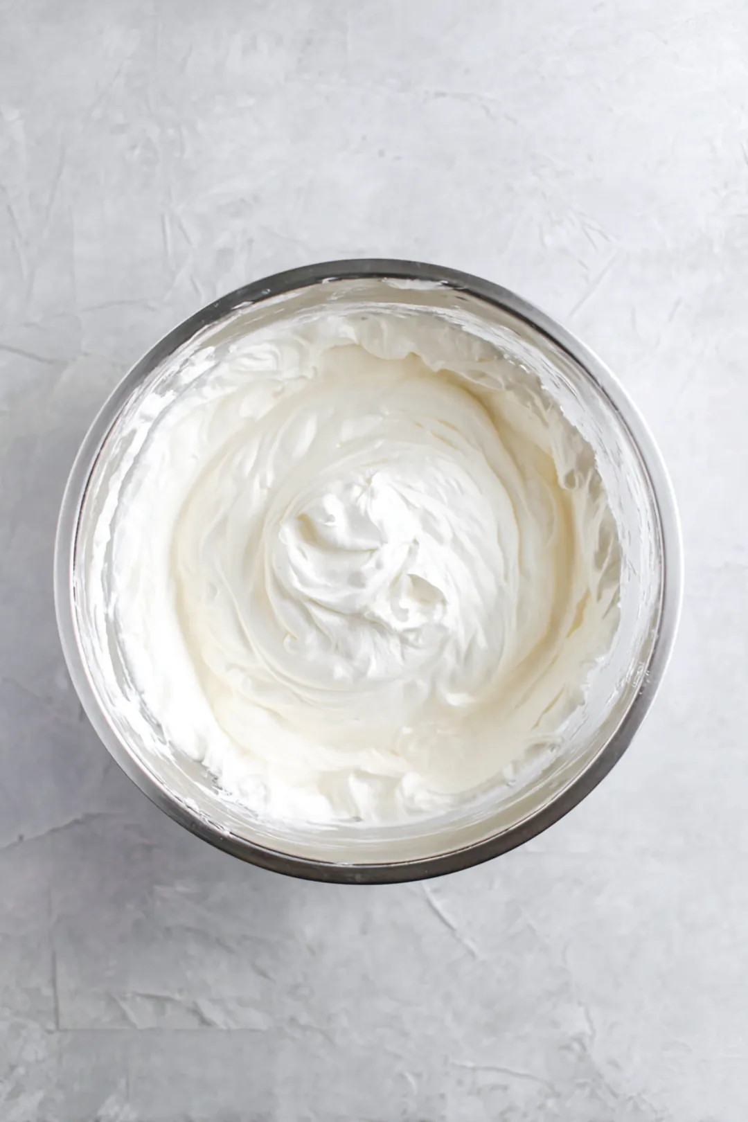 Beat the softened cream cheese and mix with powdered sugar