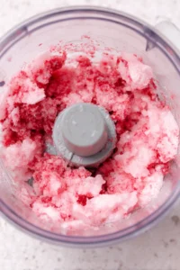 Blend crushed ice until frosty consistency