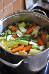 Combine all vegetable scraps with water in a large stockpot