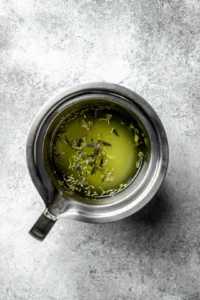 Combine cooled butterfly pea flower tea, lime juice, and simple syrup in a shaker and shake well until chilled