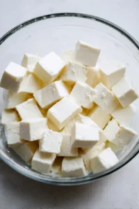 Combine cubed paneer and buttermilk in a bowl and let it soak for 10 minutes