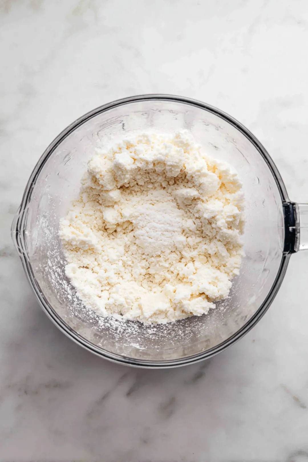 Combine flour, sugar, and salt, then cut in cold butter and add ice water to form dough