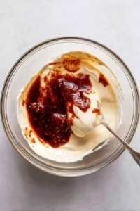 Combine heavy cream, Korean chili paste, and soy sauce in a bowl