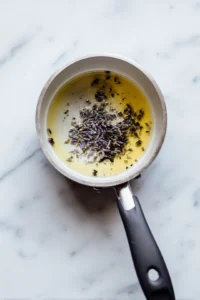 Combine honey, dried lavender buds, and water in a saucepan and simmer for 5 minutes