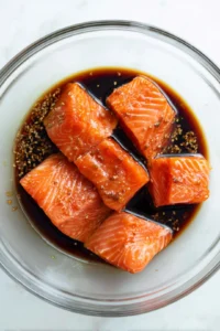 Combine soy sauce and honey to create a marinade for the salmon