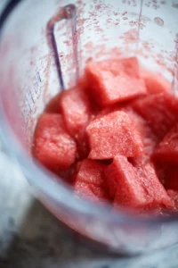 Combine the cubed watermelon and brewed hibiscus tea in a blender and blend until smooth