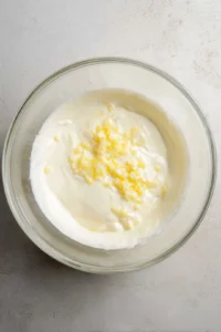 Combine the fermented kefir, olive oil, apple cider vinegar, honey, and minced garlic