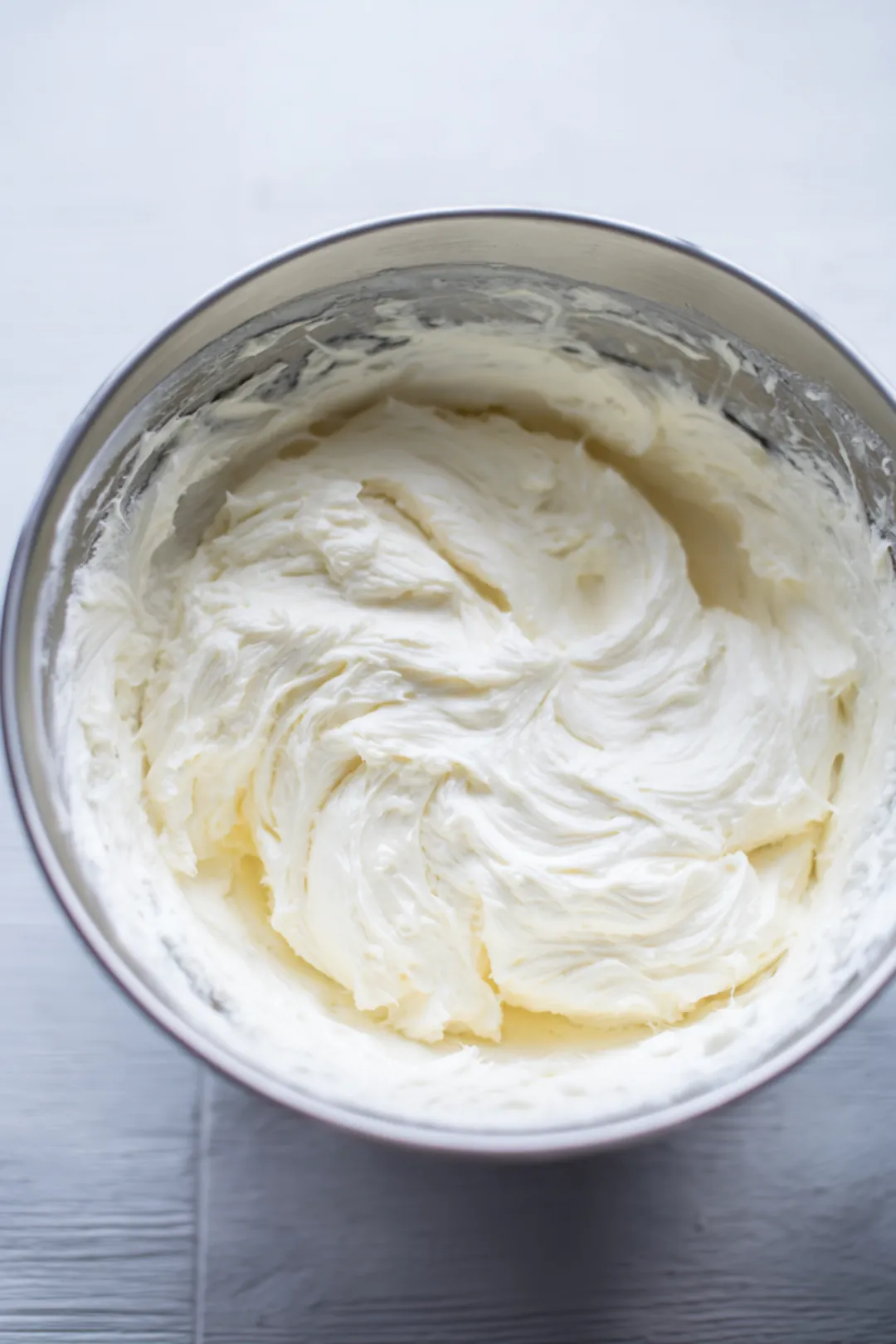 Combine the softened cream cheese and sugar in a mixing bowl