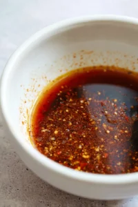 Combine water, soy sauce, olive oil, brown sugar, and jerk seasoning to create marinade