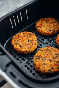 Cook veggie burgers in air fryer until golden and crispy