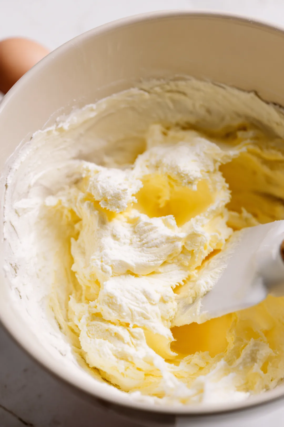 Cream together the butter and sugar until light and fluffy