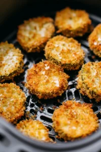 Dip each pickle slice into the beer batter