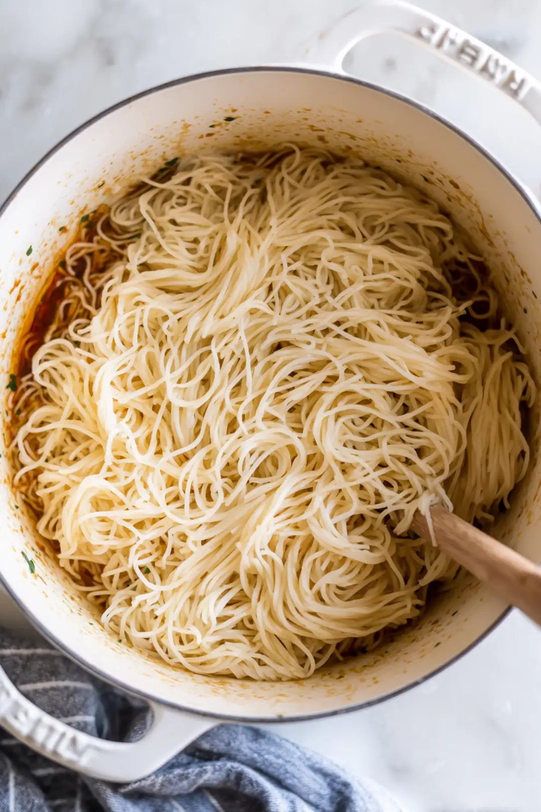 Drain the noodles and combine them with the sauce mixture, stirring well to coat all the noodles.
