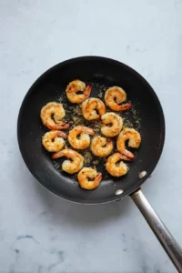 Fry the shrimp until golden brown and crispy