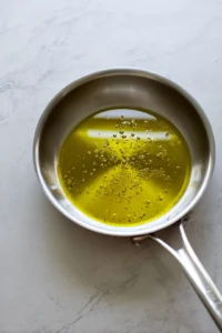 Heat olive oil in a large skillet over medium heat.