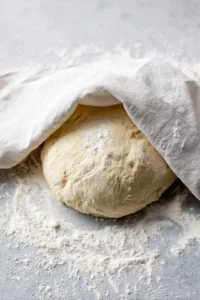 Knead the dough and let it rest