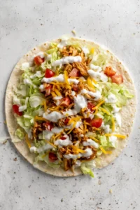 Layer the ingredients on the tortilla