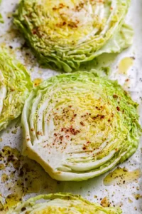 Place cabbage steaks on a baking sheet to roast