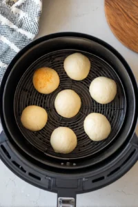 Place croutons in air fryer