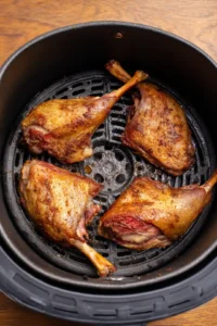 Place duck legs in air fryer