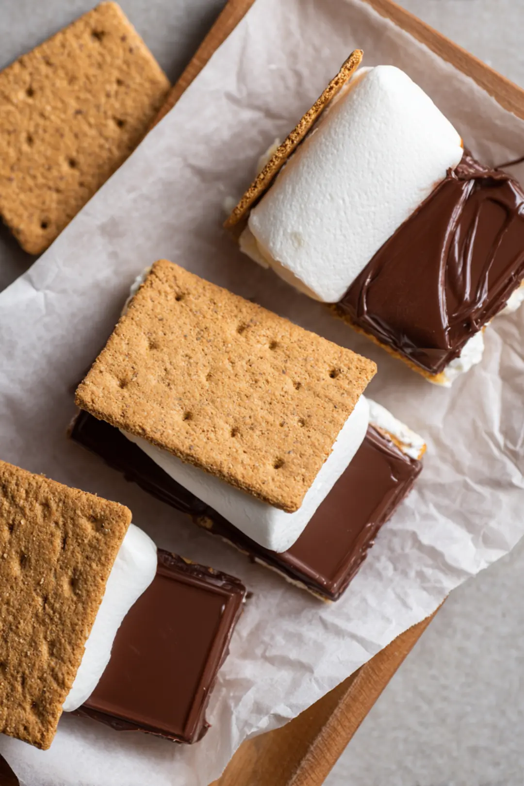 Place graham crackers, chocolate, and marshmallows in air fryer