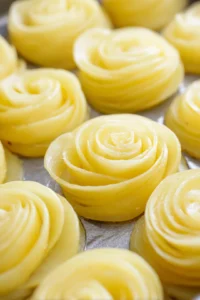 Place potato roses in air fryer and cook until golden and crispy