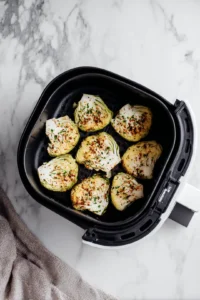Place seasoned cabbage in air fryer
