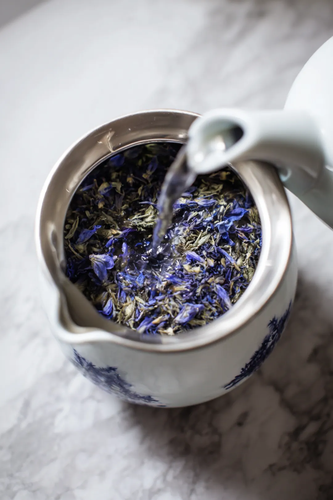 Pour hot water over dried butterfly pea flowers and steep for 5 minutes