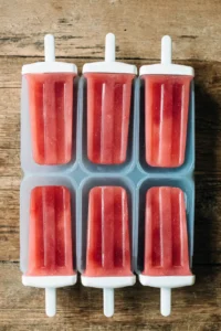 Pour mixture into popsicle molds and insert sticks, then freeze for at least 4 hours until solid