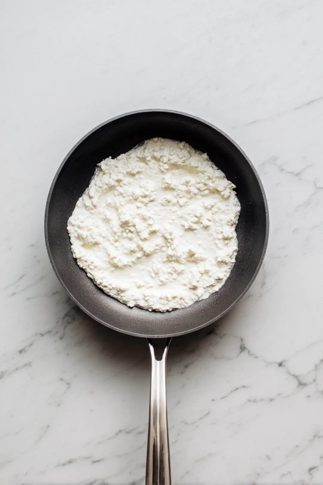 Pour mixture into skillet to cook flatbread