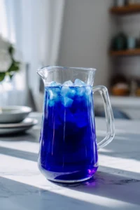 Pour strained tea into a pitcher and add sweetener and lemon juice