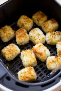 Preheat the air fryer to 375 degrees Fahrenheit and cook musubi bites until crispy