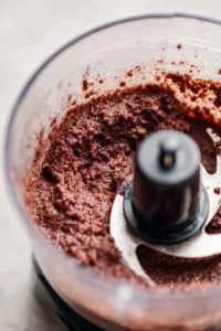 Process the pitted prunes in a food processor until smooth