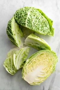 Remove the outer leaves of the cabbage and cut it into thin slices or chips. Rinse the slices under cold water and pat them dry with a paper towel.