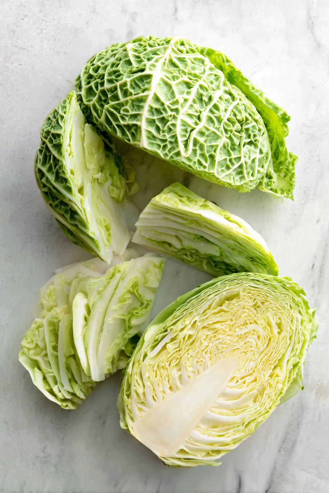 Remove the outer leaves of the cabbage and cut it into thin slices or chips. Rinse the slices under cold water and pat them dry with a paper towel.